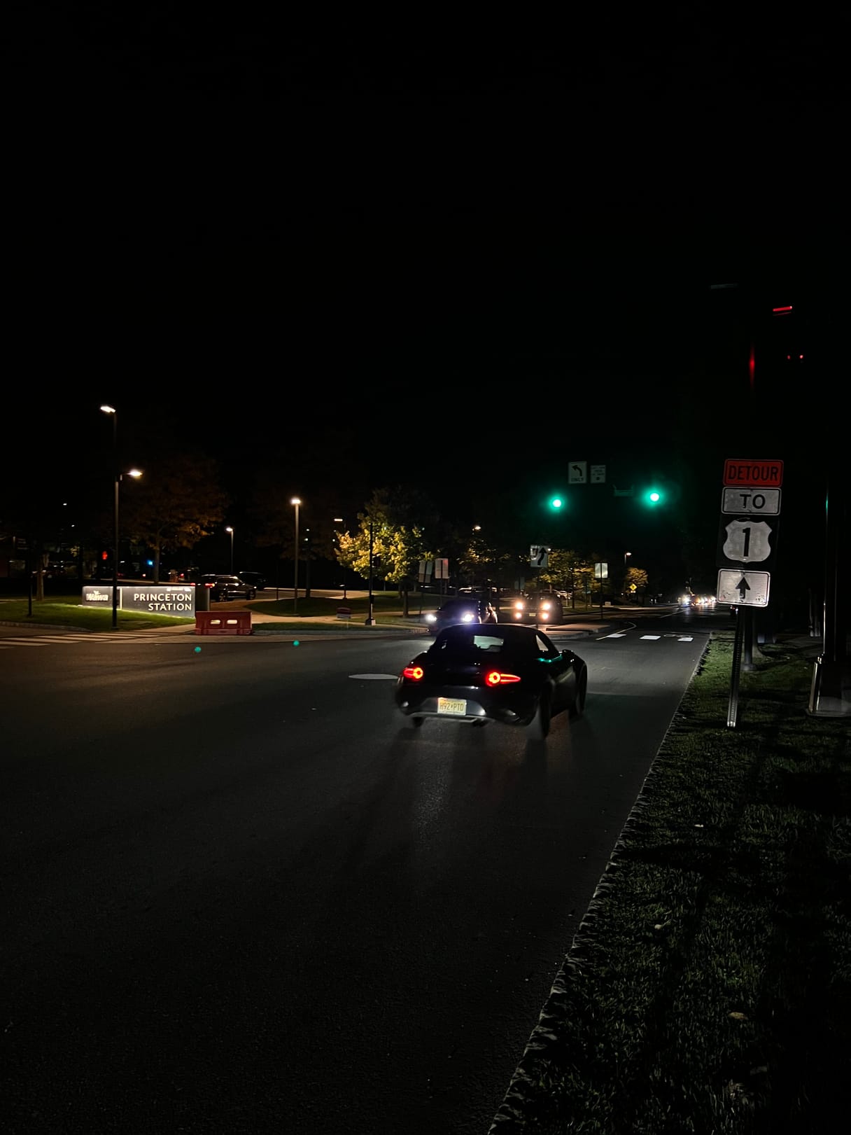 A night picture of the street just outside of Princeton Station.