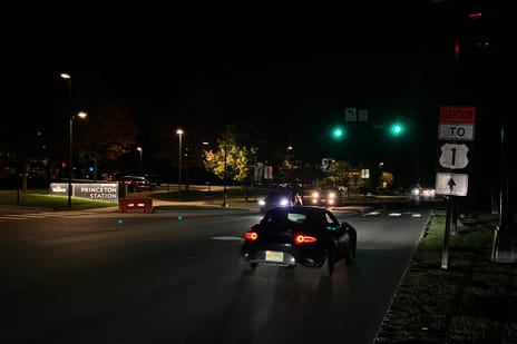 A night picture of the street just outside of Princeton Station.